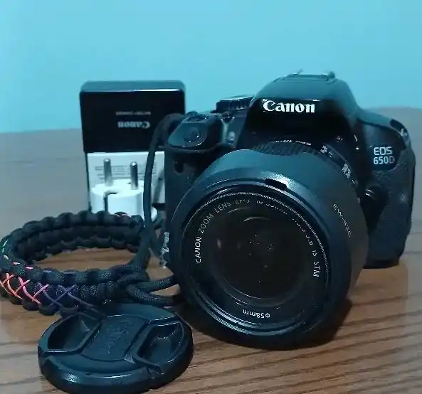 دوربین کنون Canon EOS 650D با لنز 18-55 STM دست دو