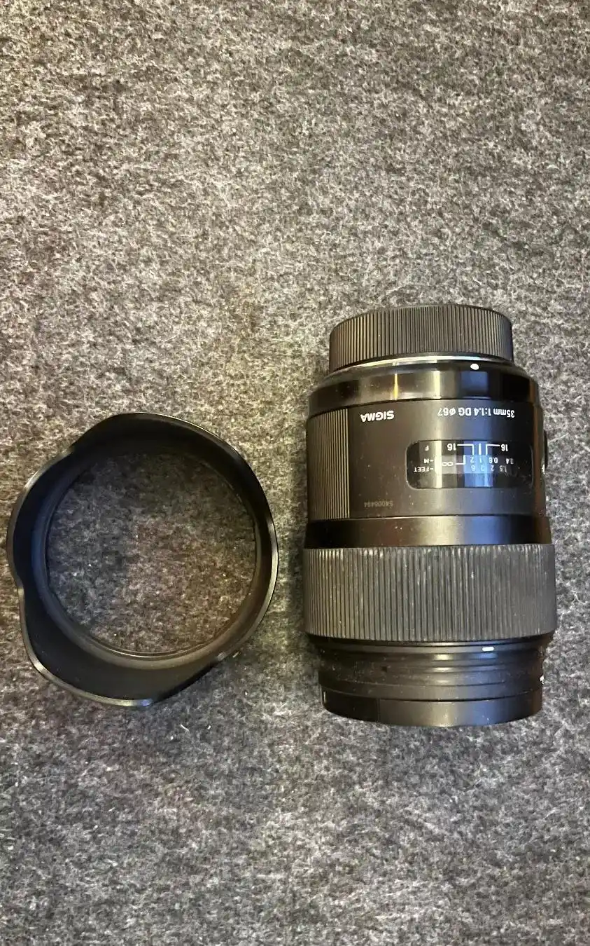 لنز سیگما Sigma 35mm f/1.4 DG HSM Art مانت نیکون دست دو