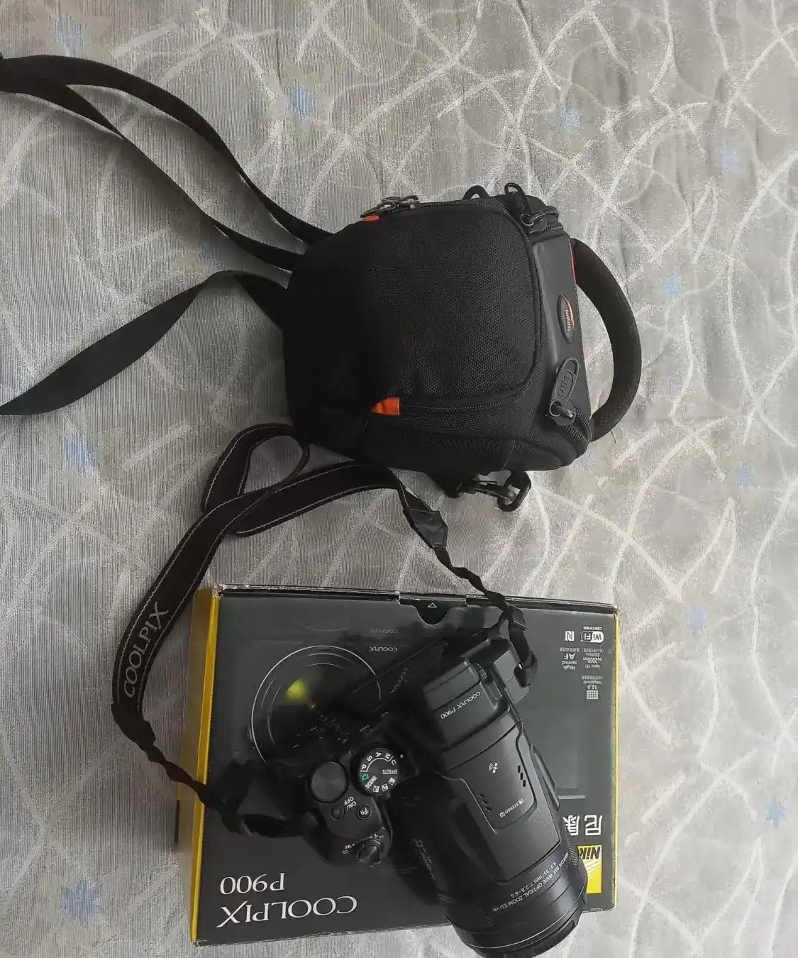 دوربین عکاسیp900 دست دو